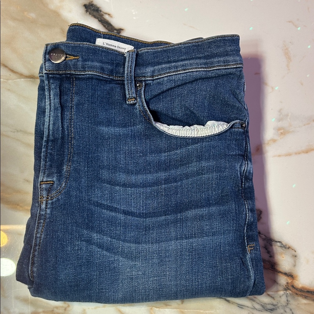 Frame Denim Label on Light Fabric